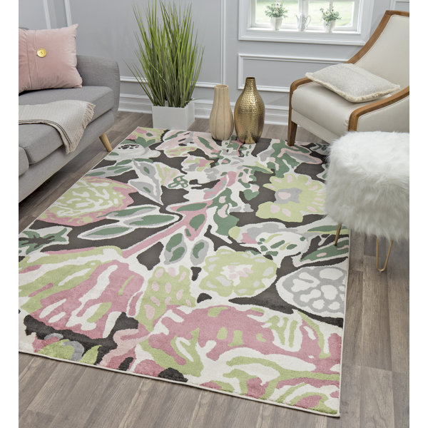 pink and green outdoor rug